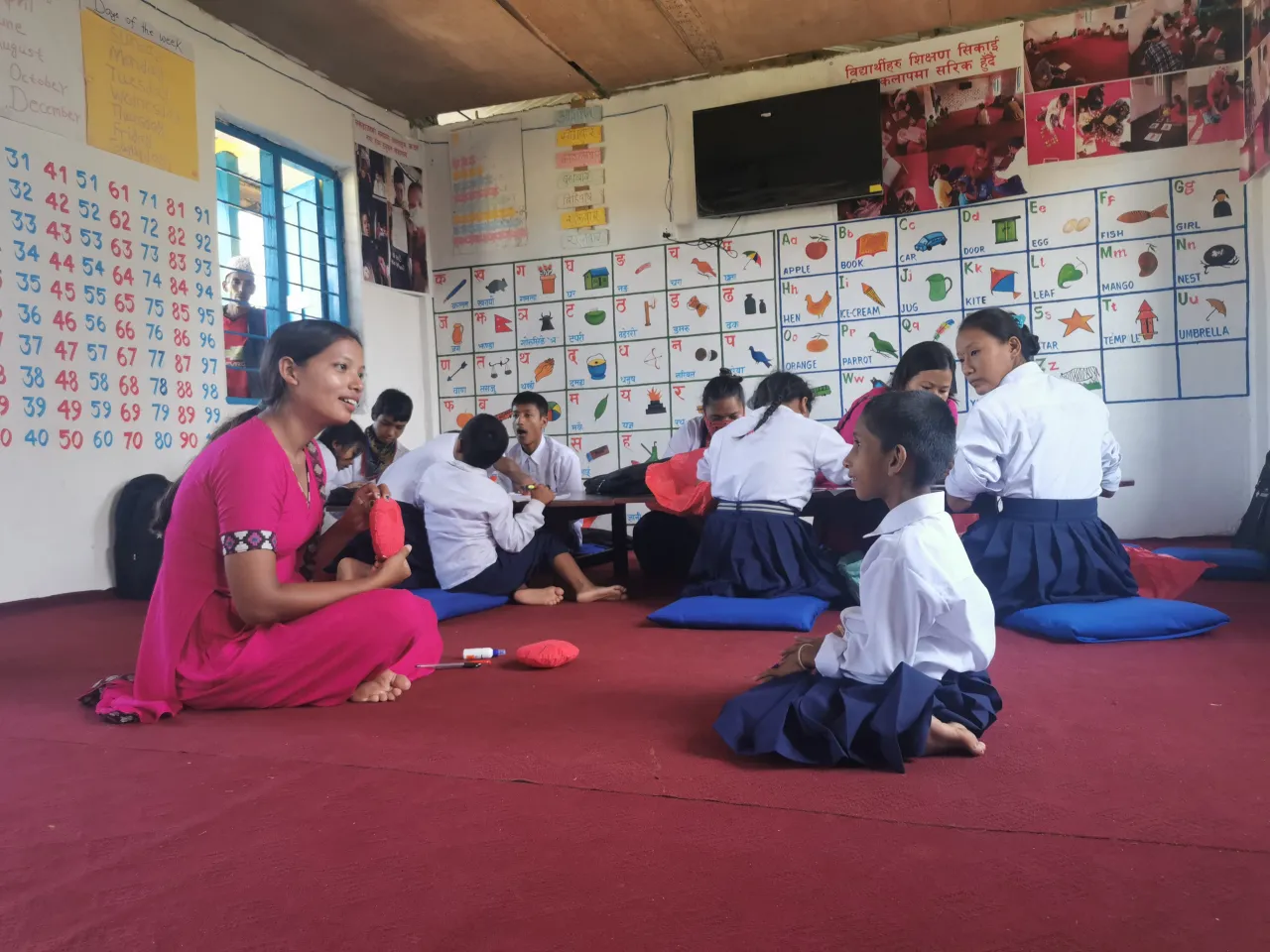 Teacher Rubi Magar and student Urmina at PFPID:s classroom.