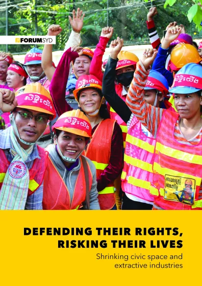 Workers raising fists in the air cover of report Defending their rights risking their lives