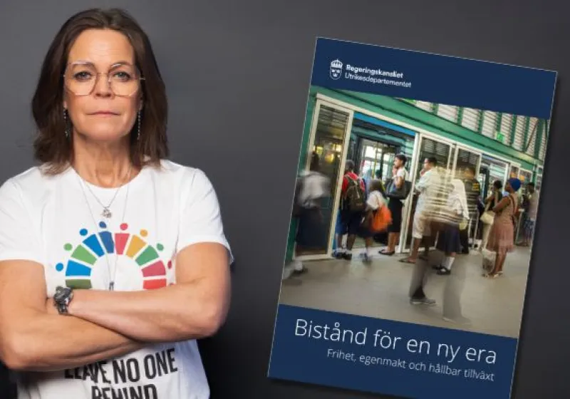 Anna Stenvinkel står med armarna i kors iklädd en t-shirt med texten leave no one behind. Bredvid henne syns framsidan av reformagendan.
