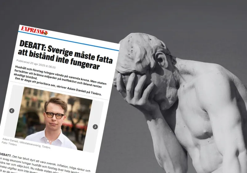 Bild på staty som tar sig för pannan. Skärmdump på debattartikel i Expressen.